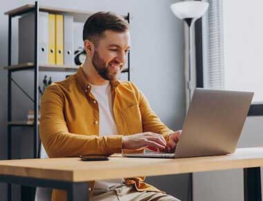 Guy Filling Put Form For Pet Insurance